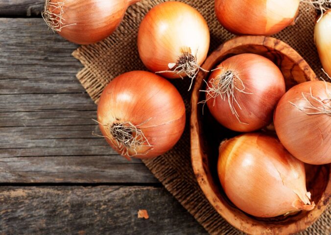 Shot of fresh onions, one of five everyday plant foods that reduce dementia risk