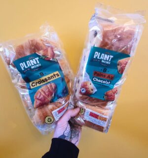 Photo shows someone's hand holding up packs of the popular Aldi vegan croissants, which the supermarket lhas brought back for Veganuary 2026