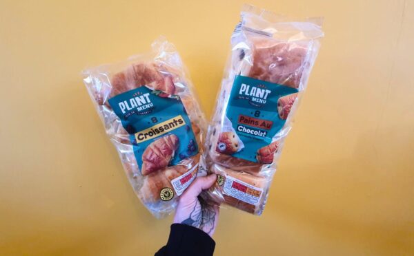 Photo shows someone's hand holding up packs of the popular Aldi vegan croissants, which the supermarket lhas brought back for Veganuary 2026