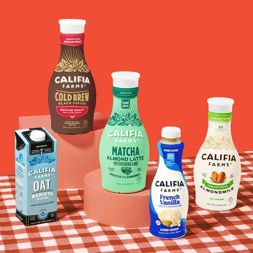 Photo shows some of the Califia Farms range on a red gingham tablecloth