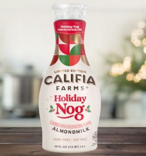 Photo shows the Califia Farms "Holiday Nog," a vegan take on eggnog without animal ingredients or alcohol, against a festive, Christmas backgroun