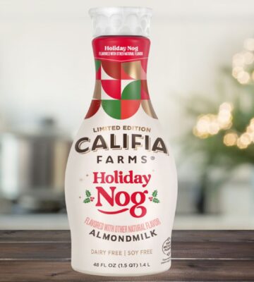 Photo shows the Califia Farms "Holiday Nog," a vegan take on eggnog without animal ingredients or alcohol, against a festive, Christmas backgroun