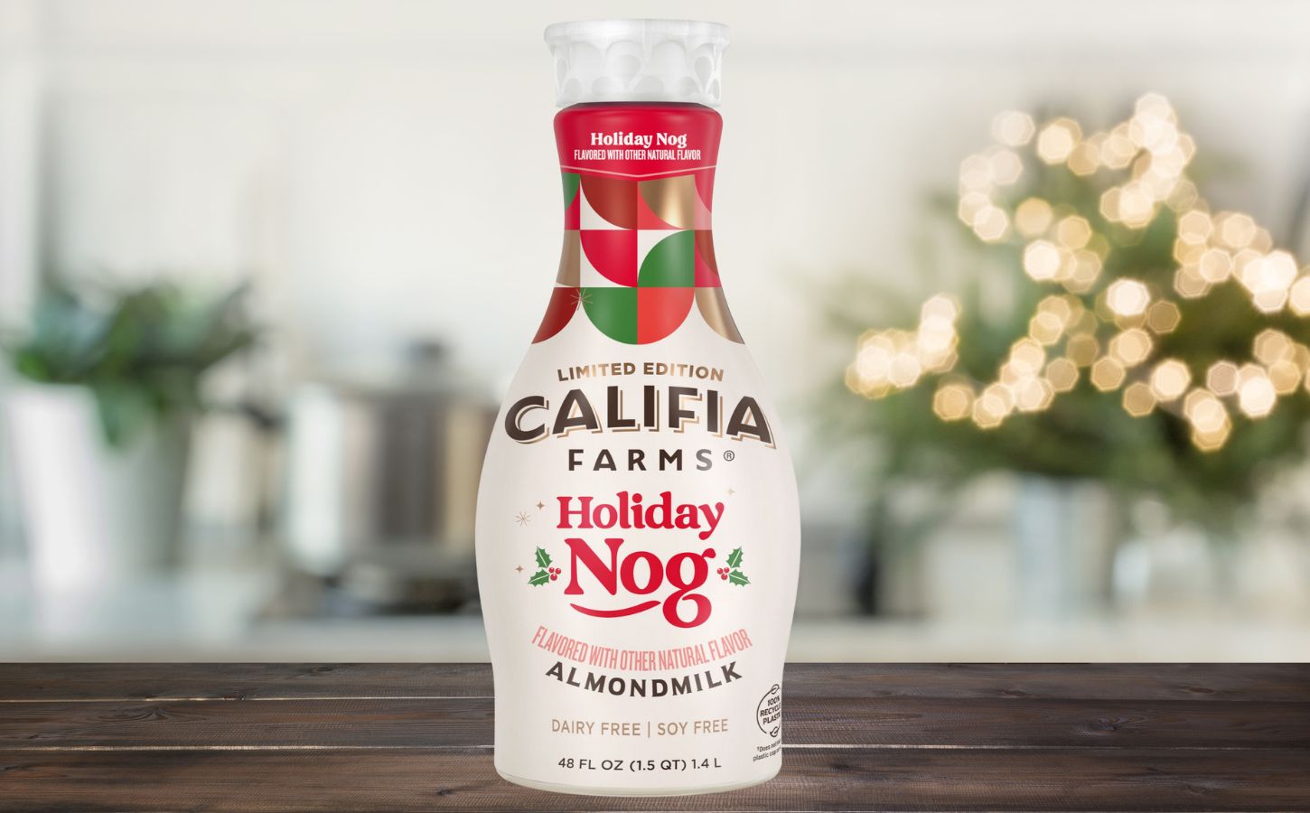 Photo shows the Califia Farms "Holiday Nog," a vegan take on eggnog without animal ingredients or alcohol, against a festive, Christmas backgroun