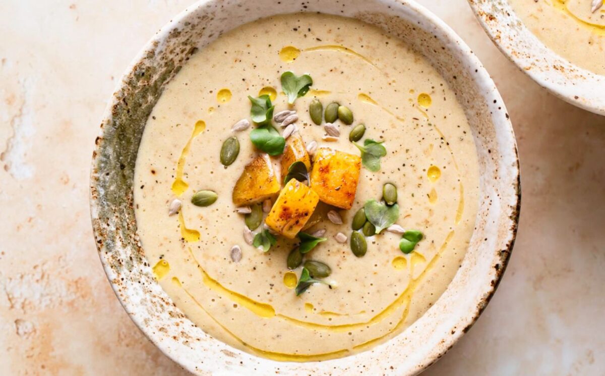 creamy roasted gold potato leek soup with coconut milk, nutritional yeast and pumpkin seeds
