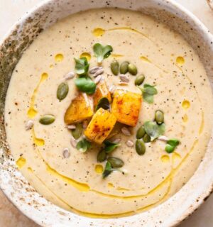 creamy roasted gold potato leek soup with coconut milk, nutritional yeast and pumpkin seeds