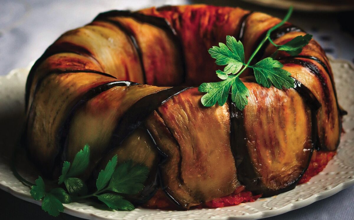 a timbalo made with eggplant and tomato rice bake and vegan mozzarella for gluten-free holiday recipes