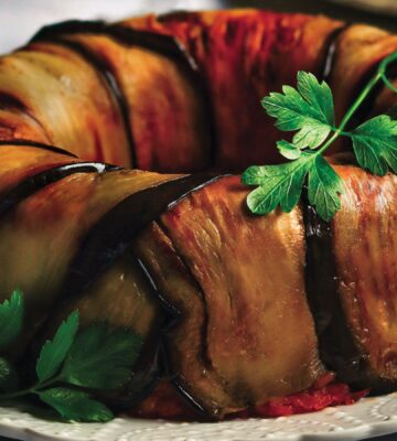 a timbalo made with eggplant and tomato rice bake and vegan mozzarella for gluten-free holiday recipes