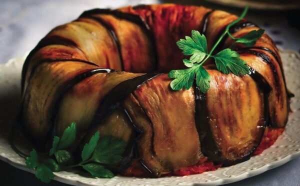 a timbalo made with eggplant and tomato rice bake and vegan mozzarella for gluten-free holiday recipes