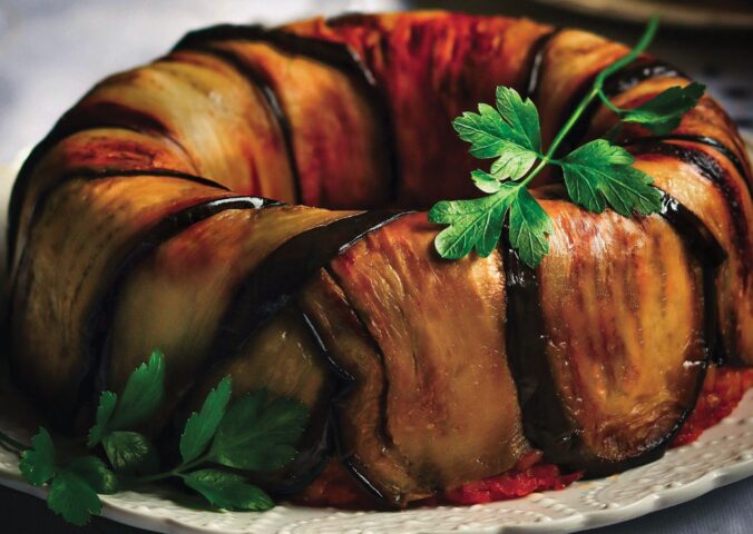 a timbalo made with eggplant and tomato rice bake and vegan mozzarella for gluten-free holiday recipes