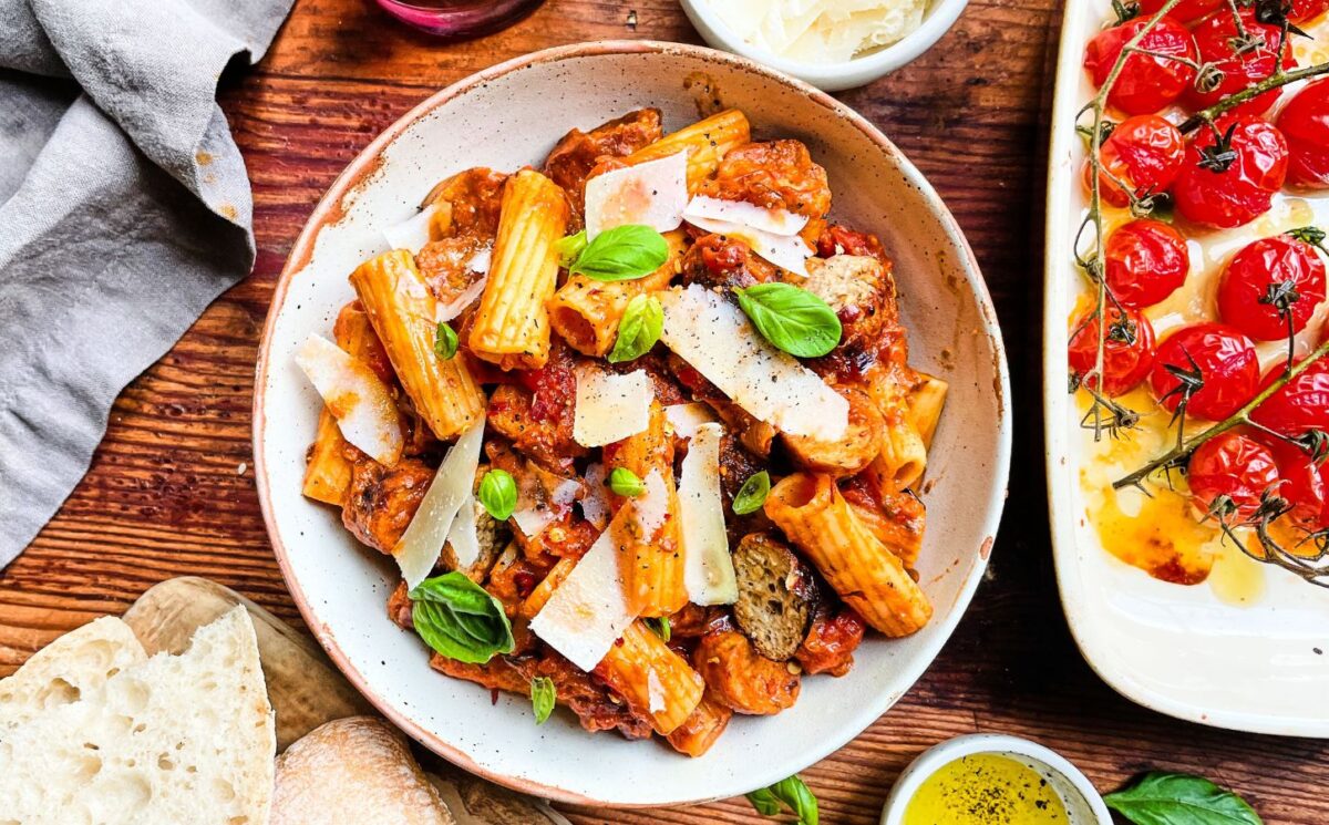 spicy tomato and sausage rigatoni with nutritional yeast and sundried tomatoes for high-protein pasta dishes