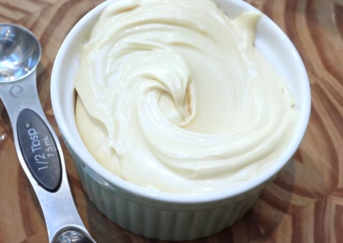 a close up of the homemade vegan butter with annatto