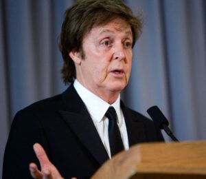 Photo shows Paul McCartney speaking at a podium. Paul McCartney and his family have called for the EU to reconsider its proposed ban on the use of ‘meaty’ words on plant-based food labels