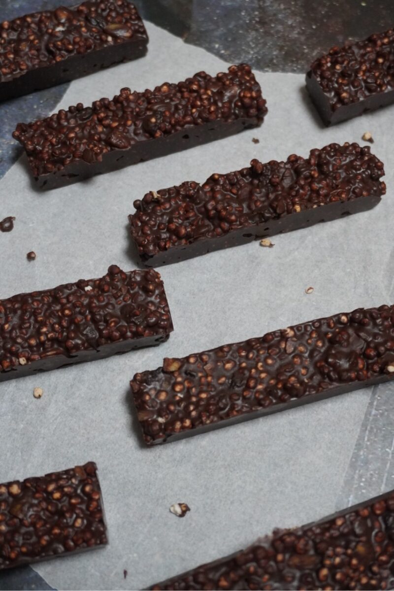 pop quinoa chocolate bars with cranberries, pop quinoa, pumpkin seeds, and peanut butter