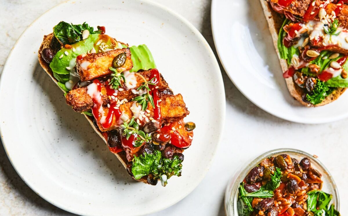 a plate of sizzling tofu, kale and black bean toast for quick cold weather meals
