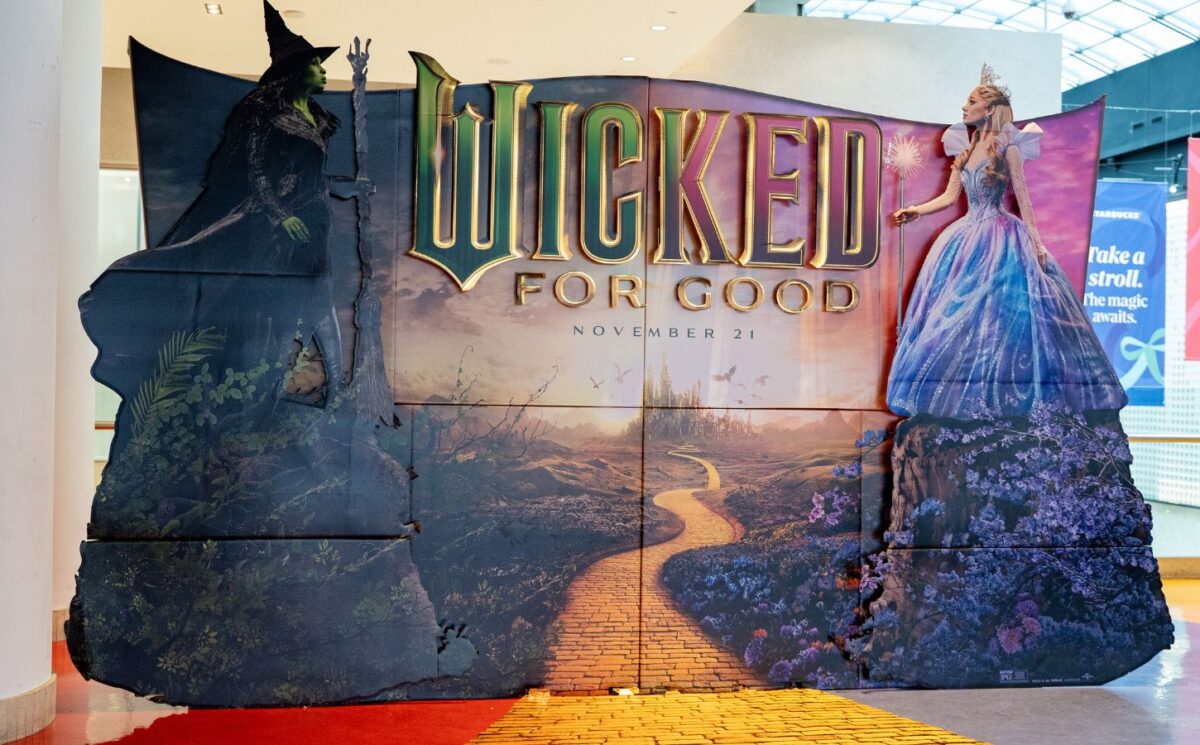 Photo shows a cardboard cut-out advertising the latest 'Wicked' movie, starring Cynthia Erivo and Ariana Grande
