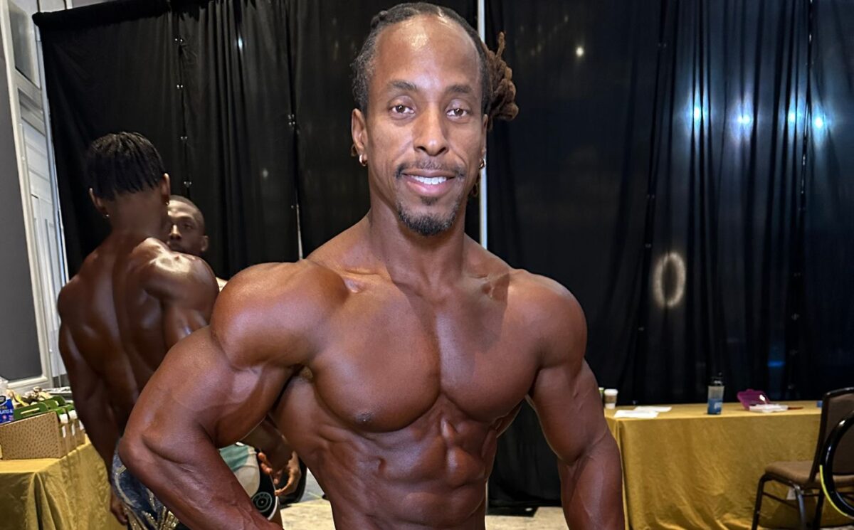 Photo shows vegan athlete Torre Washington at the 2025 Ben Weider Naturals Pro in November, where he took first place in two different classes, the Open Masters and Masters 40, thereby qualifying for Mr Olympia 2026 next September