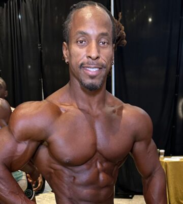 Photo shows vegan athlete Torre Washington at the 2025 Ben Weider Naturals Pro in November, where he took first place in two different classes, the Open Masters and Masters 40, thereby qualifying for Mr Olympia 2026 next September