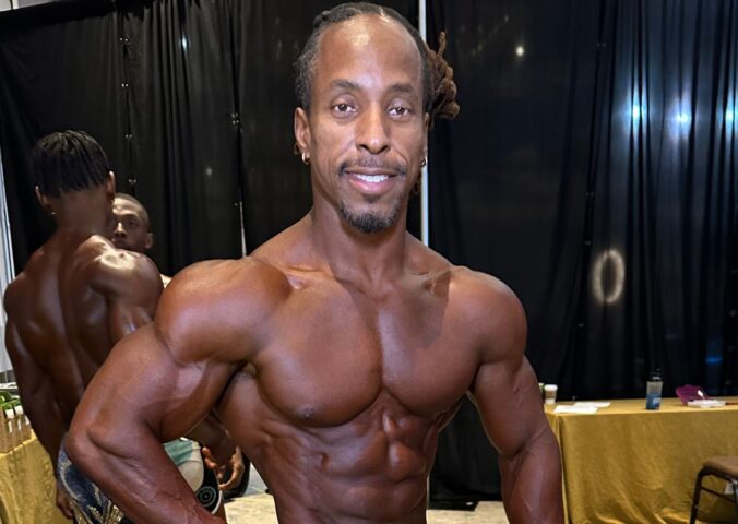Photo shows vegan athlete Torre Washington at the 2025 Ben Weider Naturals Pro in November, where he took first place in two different classes, the Open Masters and Masters 40, thereby qualifying for Mr Olympia 2026 next September