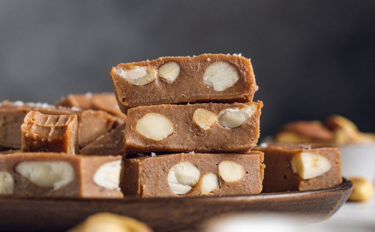 pieces of Brazil nut fudge filled with whole Brazil nuts and made with cacao and maple syrup for snacky sweets