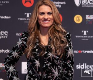 Photo shows Karen Carney, a vegan journalist, former footballer, and current celebrity guest on 'Strictly Come Dancing,' posing on the red carpet at the FEVO Sport Industry Awards in London, UK, earlier this year