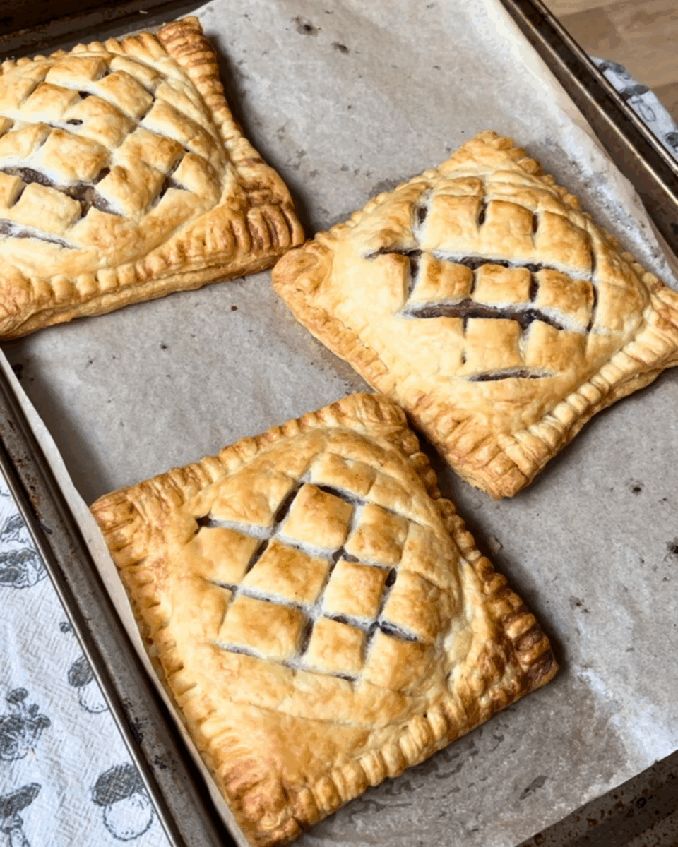 copycat Greggs vegan lattice pastry festive edition with vegan chicken, bacon, stuffing, and cranberry sauce wrapped in vegan puff pastry