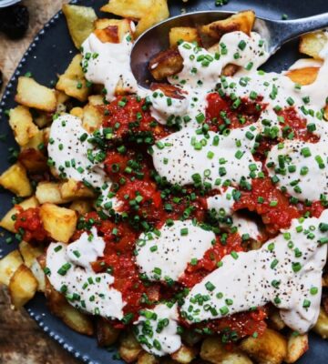 patatas bravas with vegan mayo, chili, tomato, and garlic for after NYE