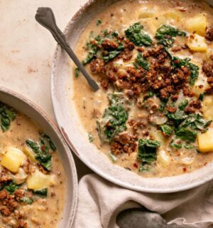 vegan zuppa Toscana soup with potatoes, kale, nutritional yeast, and vegan beef