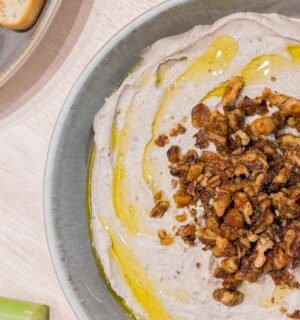 whipped tofu and rosemary walnut dip with toasted walnuts on top
