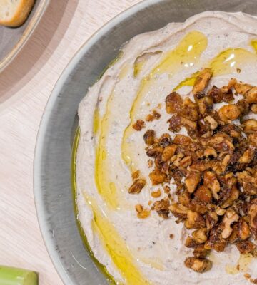 whipped tofu and rosemary walnut dip with toasted walnuts on top