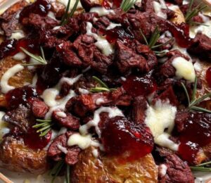 beyond steak loaded smashed potatoes with cranberry sauce and cheese