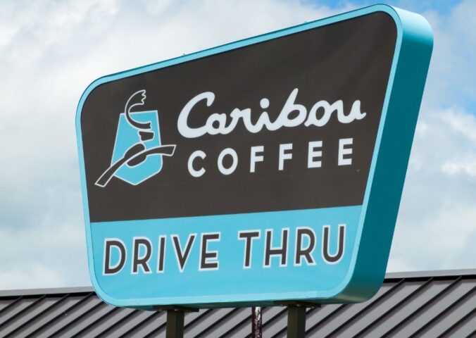 Photo shows the sign of a Caribou Coffee Drive Thru store. Caribou Coffee just announced that it will be scrapping its plant-based milk surcharge going forward