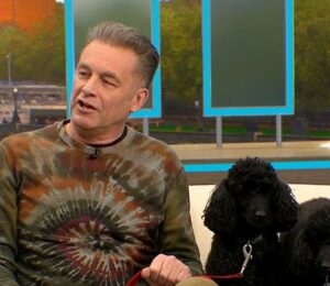 Photo shows Chris Packham, left, and his dogs Sid and Nancy, right, in a recent appearance on 'Good Morning Britain,' where Packham explained why his dogs were following a plant-based diet for Veganuary