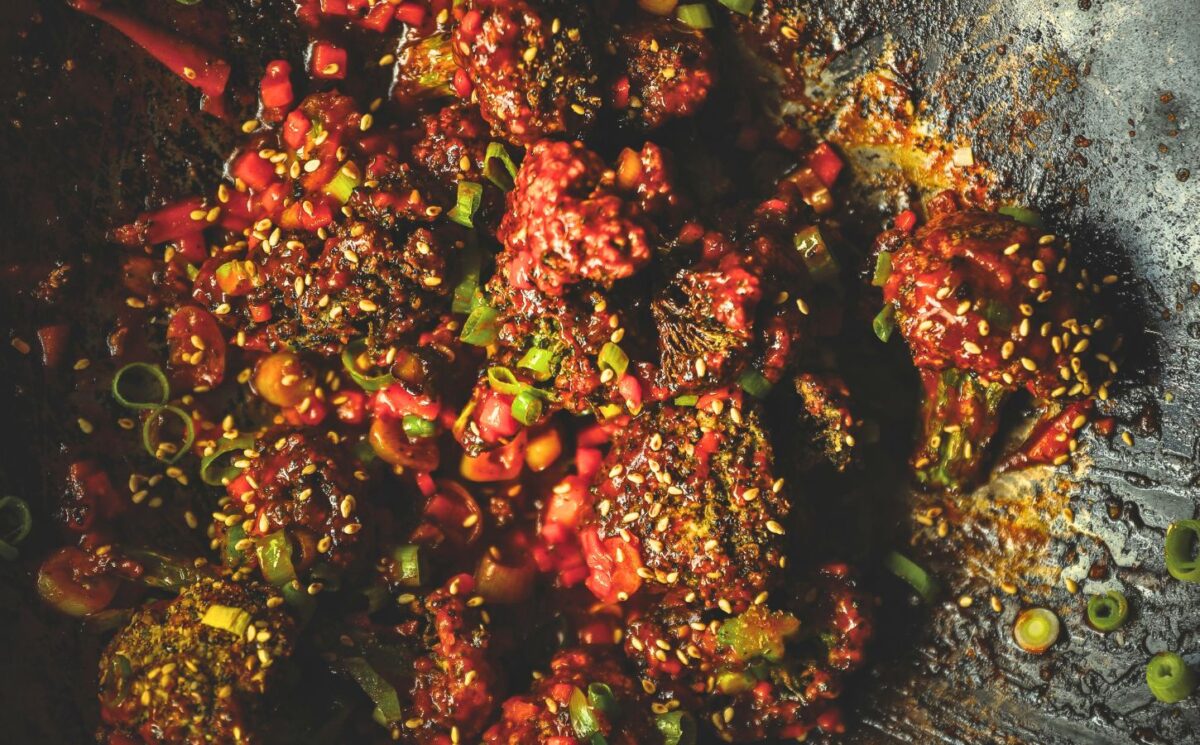 firecracker broccoli with gochujang, garlic, scallions, and soy sauce