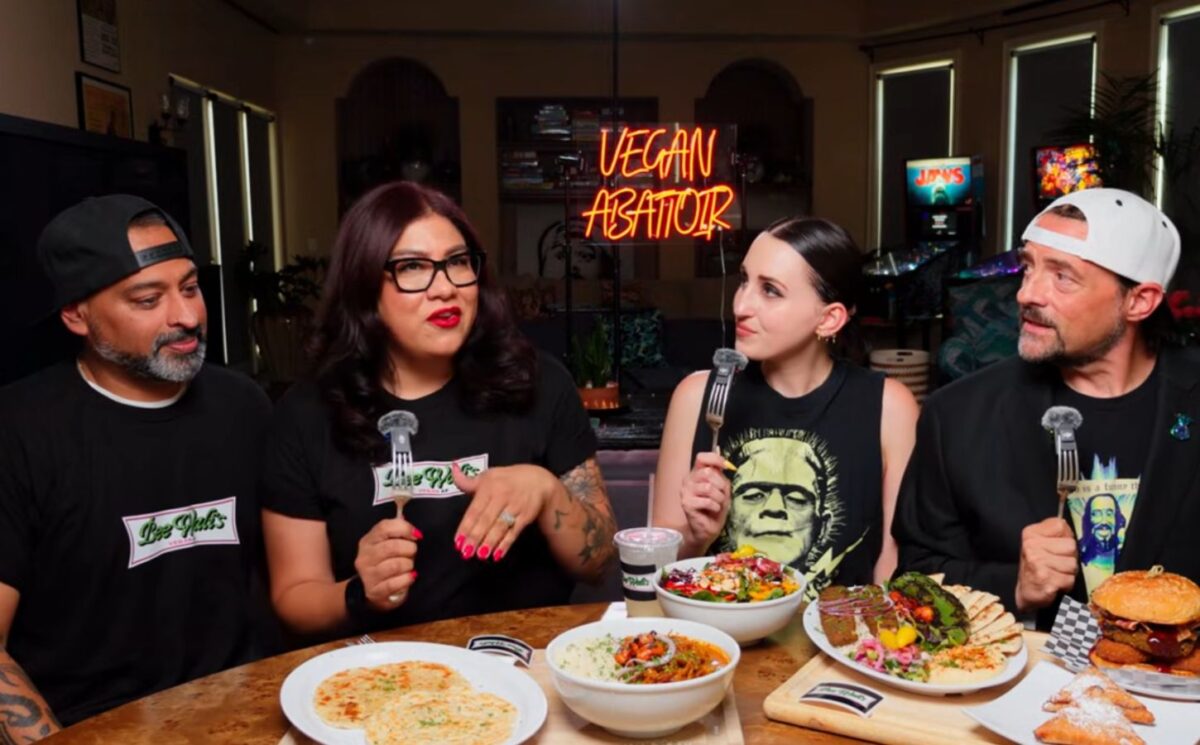 From left to right, photo shows Bee and Wali, the founders of Beewalis's Vegan AF, speaking to Harley and Kevin Smith