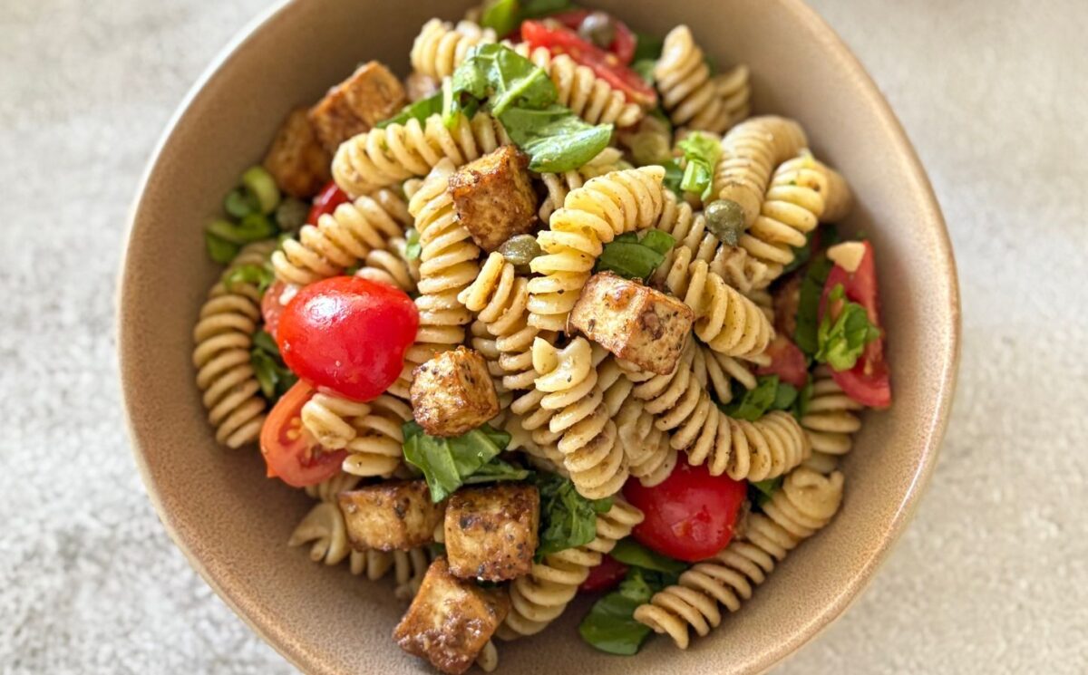 A bowl of olive paste pasta salad, a vegan pasta salad recipe for easy Veganuary lunches