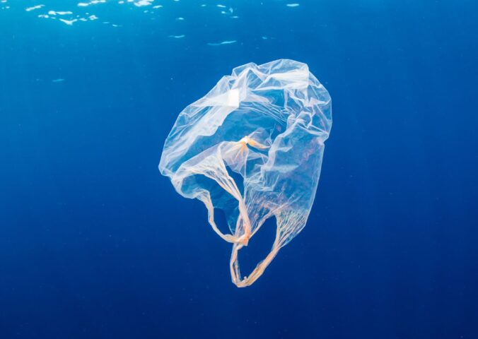 Photo shows a bag floating in the ocean. A team of researchers has created a strong, flexible, plastic-free bag that dissolves safely in sea water