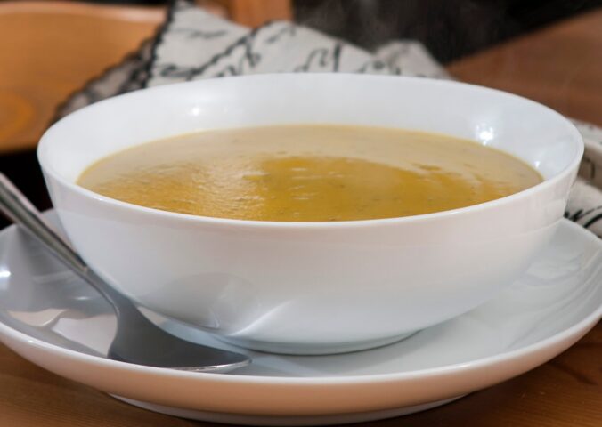 hearty split pea soup with carrots, dark leafy greens, and smoked paprika
