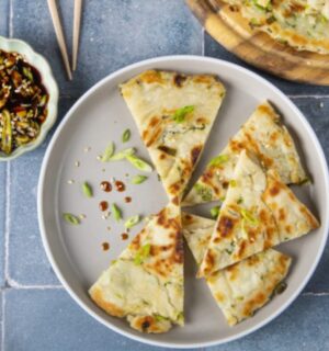 easy vegan spring onion pancakes made with maple syrup, spring onion, and sesame oil in a simple dough