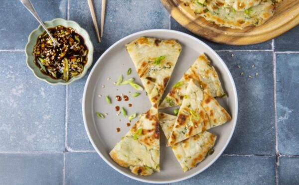 easy vegan spring onion pancakes made with maple syrup, spring onion, and sesame oil in a simple dough