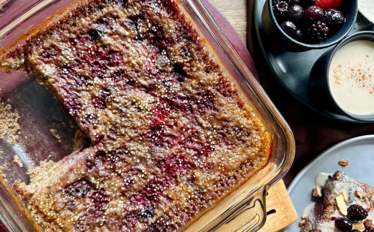 vegan quinoa sweet-berry bake made with chia seeds, blueberries, raspberries, blackberries, vanilla, maple syrup, and coconut milk and cream for cozy vegan breakfasts
