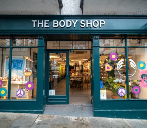 Photo shows the front of a branch of The Bodyshop, a UK bath, cosmetics, and beauty brand that was previously 100 percent vegan but no uses some animal ingredients
