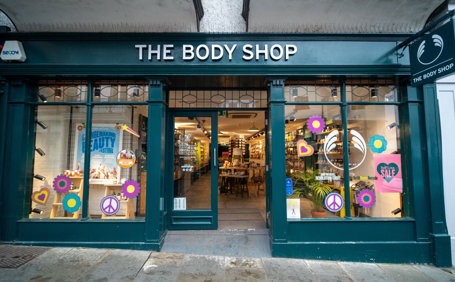 Photo shows the front of a branch of The Bodyshop, a UK bath, cosmetics, and beauty brand that was previously 100 percent vegan but no uses some animal ingredients