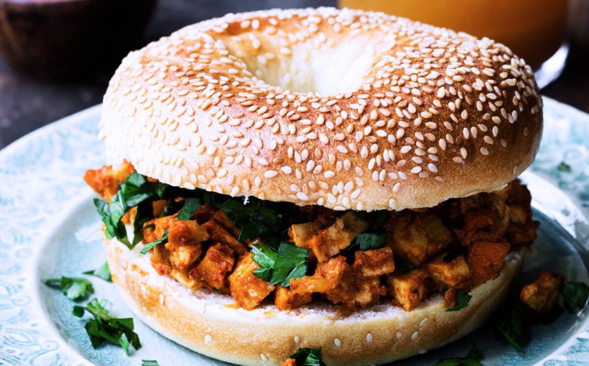 tofu taste cubes on a seeded bagel for easy Veganuary lunches