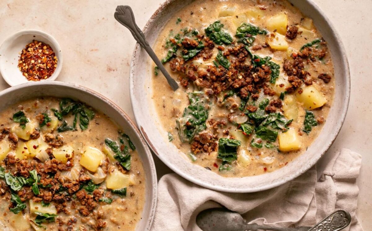 vegan zuppa Toscana soup with potatoes, kale, nutritional yeast, and vegan beef to continue Veganuary