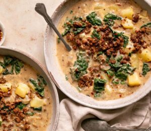 vegan zuppa Toscana soup with potatoes, kale, nutritional yeast, and vegan beef to continue Veganuary
