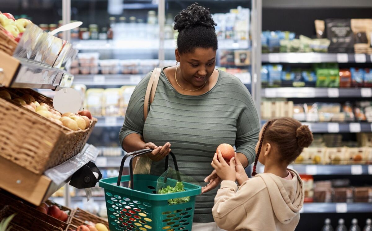 Photo shows a mother and daughter food shopping. According to Veganuary, a third of people in the UK will be shopping for plant-based foods this month