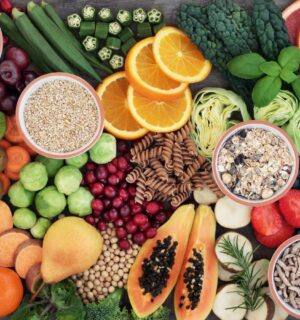 Photo shows a colorful mosaic of fresh fruit, vegetables, nuts, seeds, and other nutrient-dense plant-based foods. Hundreds of doctors and nutrition researchers have called for a return to evidence-based recommendations in the 2025–2030 Dietary Guidelines for Americans (DGA), including the prioritization of plant-based foods over high-impact meat and dairy