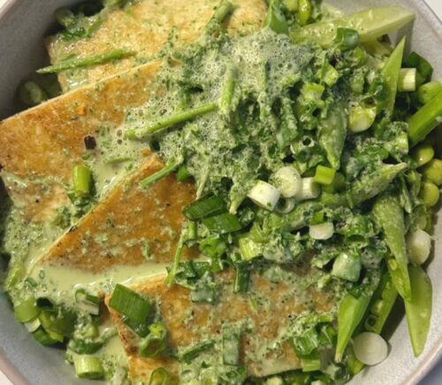 herb miso coconut bowl with edamame, sugar snap peas, and more