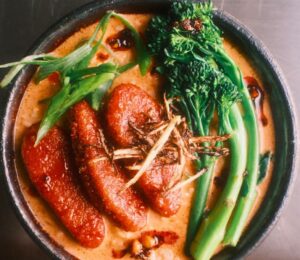Korean-Style Glazed Beyond Tenders With Coconut Broth and sticky rice
