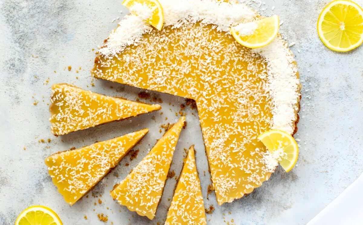 a gluten-free lemon tart with coconut milk and flakes made with kuzu